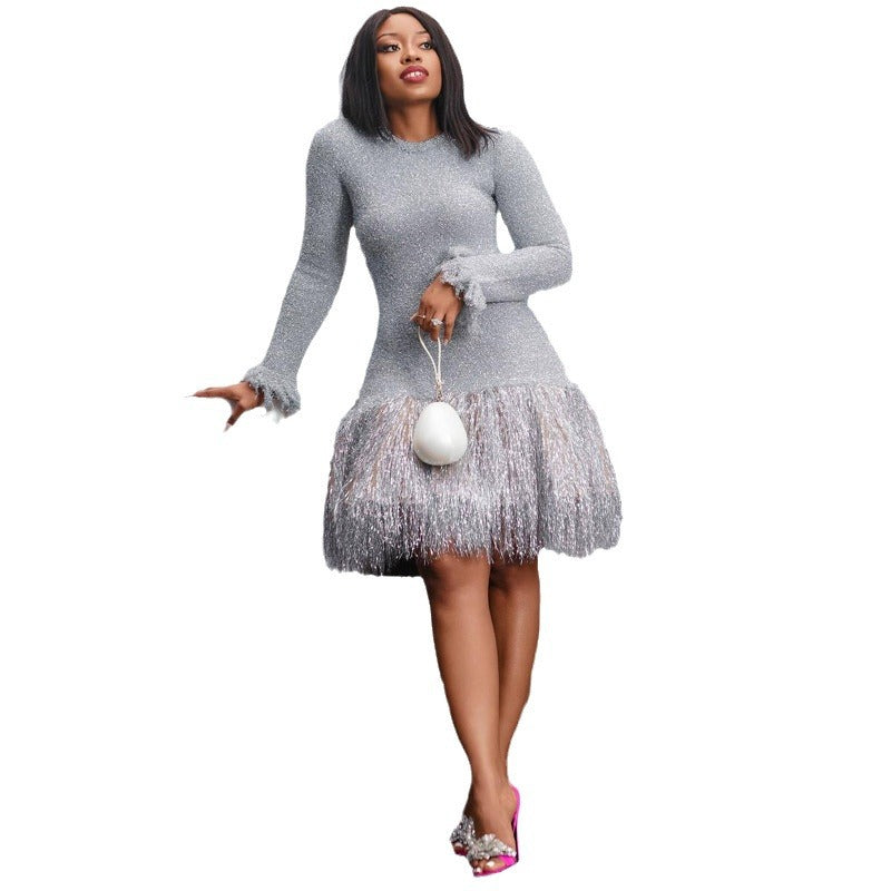 European and American women's fashionable solid color long sleeved tassel slim fit short dress