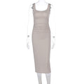 Tailored camisole revealing backpack hip dress